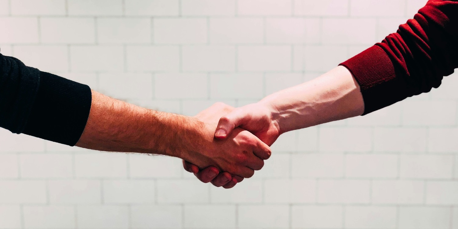 Handschlag_Bannerbild Betriebsberatung im Kfz-Gewerbe